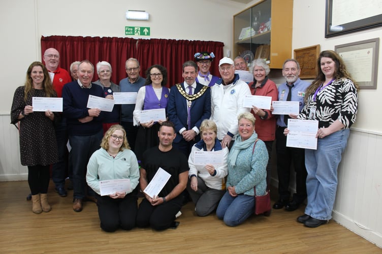 Lucky recipients of Kingsteignton Town Council grant awards with mayor Cllr Dave Ripping