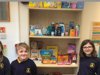 Primary school pupils open community food bank