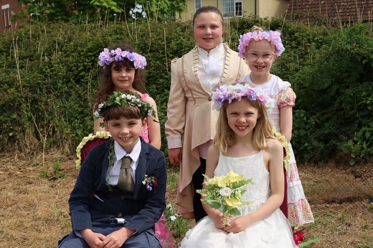Cockwood Primary School's May King and Queen, Wilbur and Georgia, with attendants Lily-Rose and Elsie, and Junior Town Crier Rosie Holmes.