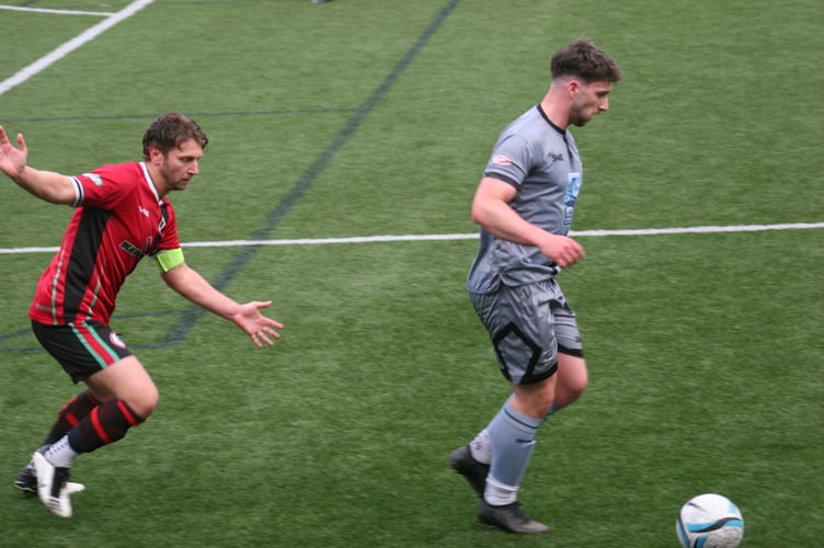 Bovey captain Cliff Walters working hard