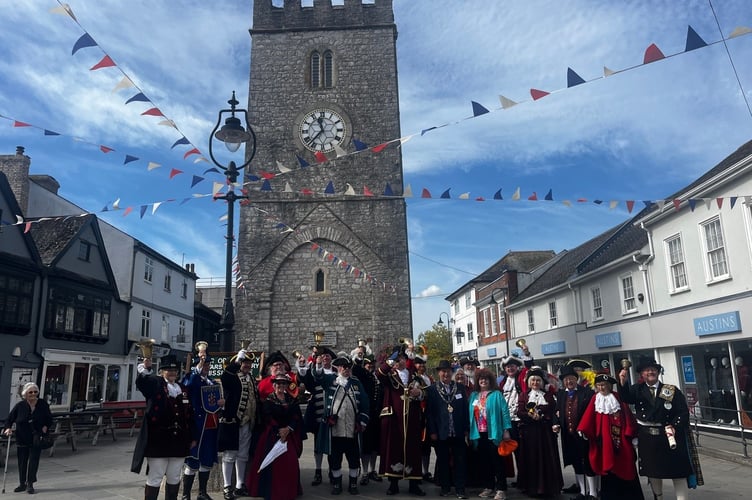 Newton Abbot's previous town crier Ken Purchase in action. photo contributed