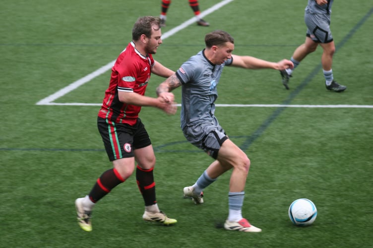 Cieran Bridger applies the pressure against Holsworthy