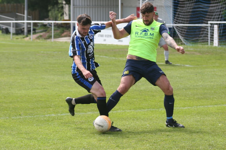 Spurs' Luis Green battling for possession against Lakeside