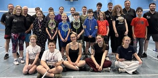 Alex and Theo claim badminton titles