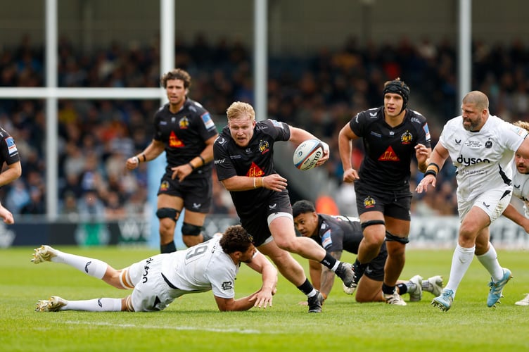 Max Norey of Exeter Chiefs gets away from Charlie Ewels of Bath