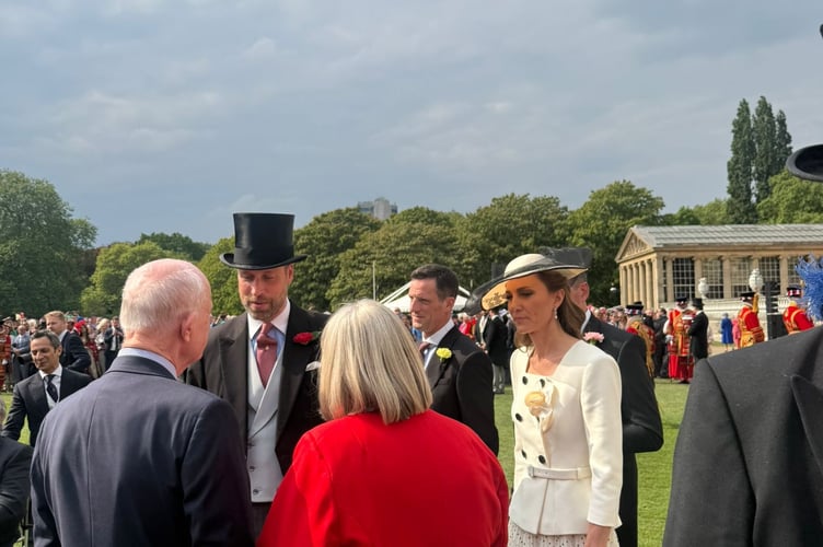Prince William and Princess Catherine with guests at the royal garden party.