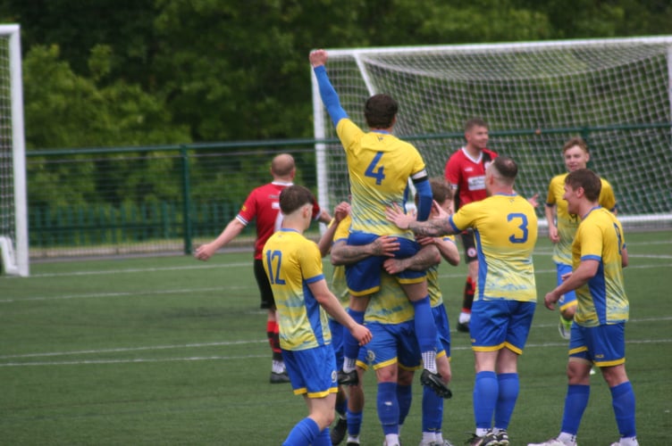 WBB celebrate doubling their lead against Bovey