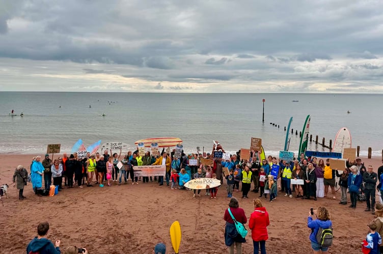 Hundreds gathered for Teignmouth's Paddle Out protest. Photo Stuart Reynolds