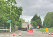 Road closed after accident as air ambulance reportedly landed in area