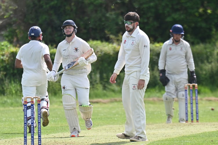 Devon Cricket League C Division West. Chudleigh versus Hatherleigh 2nd XI. Hatherleigh bowler Greg Solkin watches the Chudleigh batting order ramp up the runs