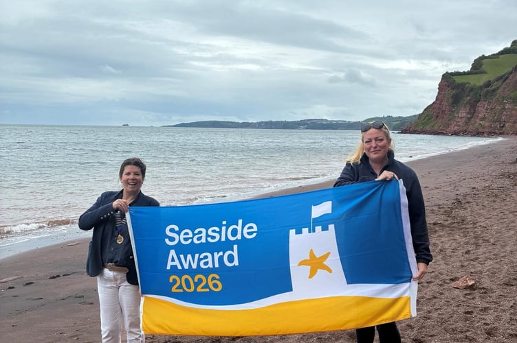 Danielle Westlake, Chair of Shaldon Parish Council, and Anna Snow, Resorts Manager, Teignbridge District Council, with the Seaside Award for Ness Cove