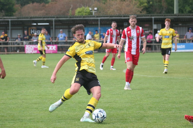 Buckland's Scott Pocock slides in against Newquay