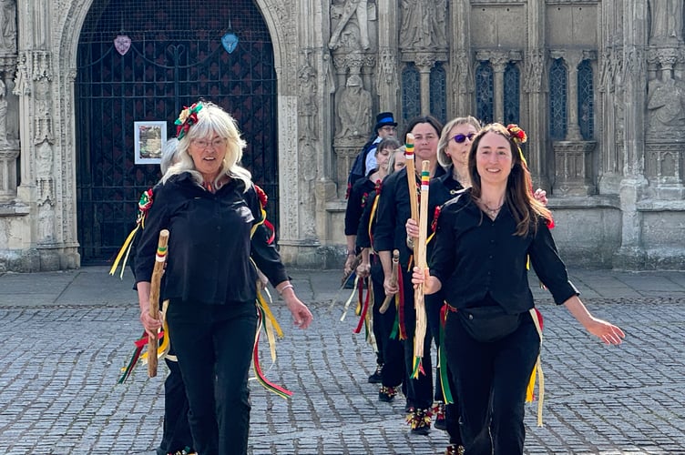 Morris dancers outside Exeter Cathedral.  AQ 2141