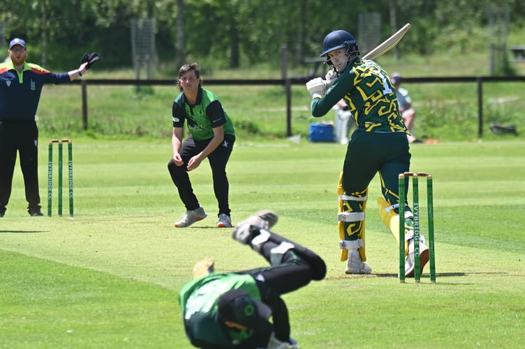 Devon Cricket League A Division. Ivybridge versus Bovey Tracey. Both Ivybridge bowler Arthur Johnson and Bovey batsman Bradley Causey watch wicket keeper Zach Dunn narrowly miss the ball