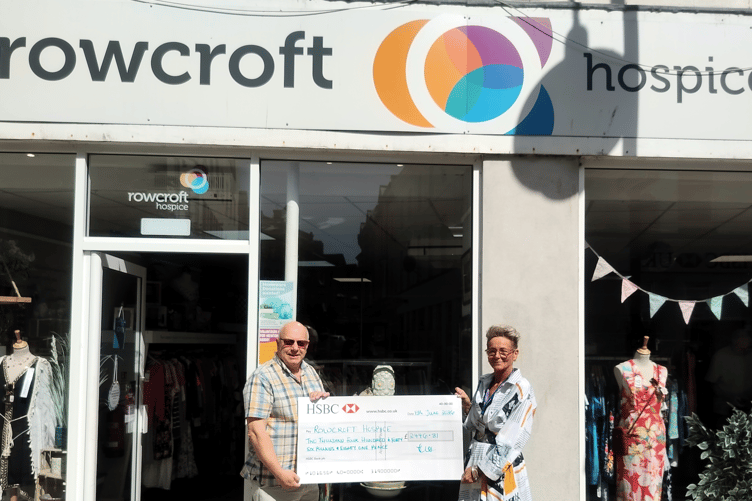 Show organiser Rob Speare presenting the cheque for £2,446 to Rowcroft Hospice