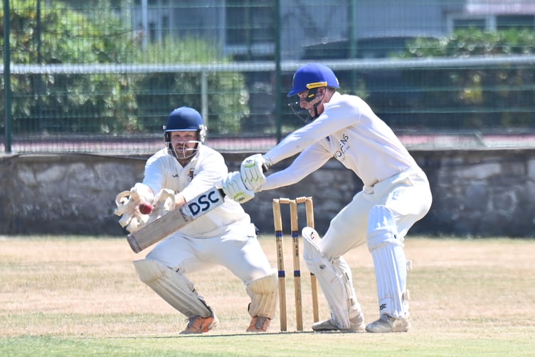 Devon Cricket League C Division West. South Devon versus Chudleigh. Chudleigh wicket Nick Halse and South Devon batsman Jack Allen