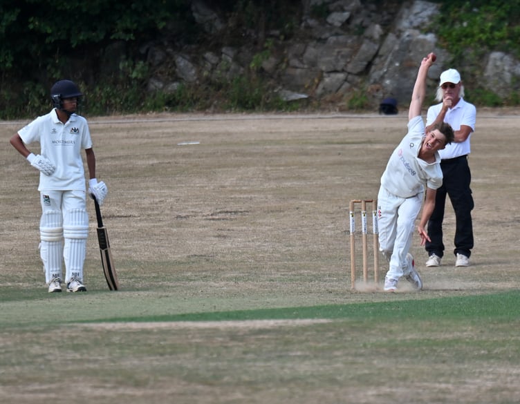 Devon Cricket League C Division West. Ipplepen 1st XI versus Plymouth 2nd XI. Pen's bowler Henry Alsop