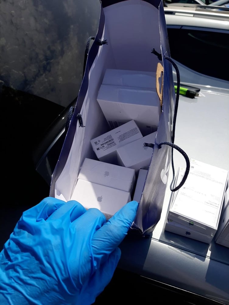 Fake Apple products seized by police in Teignmouth. Photo Teignmouth and Dawlish police