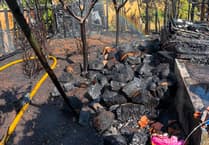 Fire spreads to four gardens in tinder dry conditions