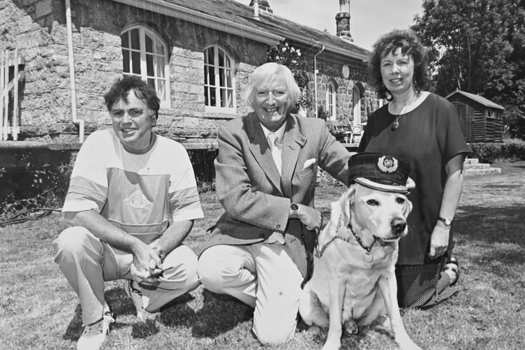 Westcounty television celebrity David Young with Oliver his dog visiting Mike and Lynn Jacobs at Lustleigh's old railway station in July 1995