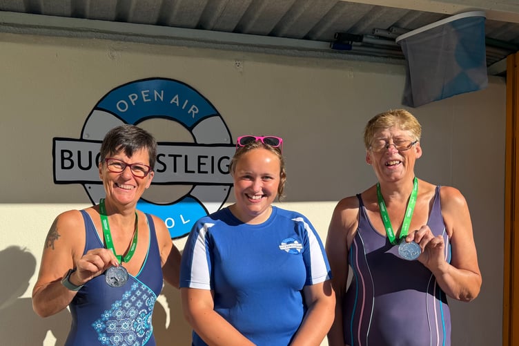 Tracy Dommett, left, and Sue Kerswell, right, with Sophie Norman, deputy manager of Buckfastleigh Pool.