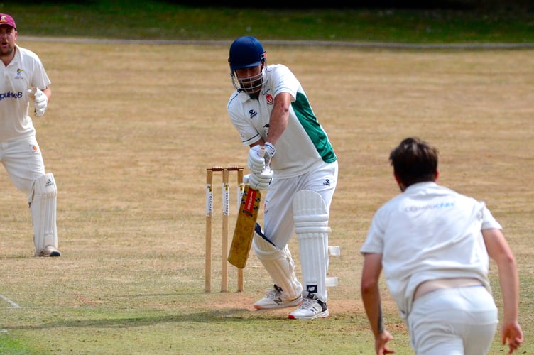 Hatherleigh tail-ender Liam Pyle takes on Ipplepen's opening bowler George Tapley