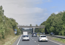 Camper van blaze brings A38 traffic to a standstill