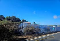 A38 shut as huge 100-metre fire spread to central reservation