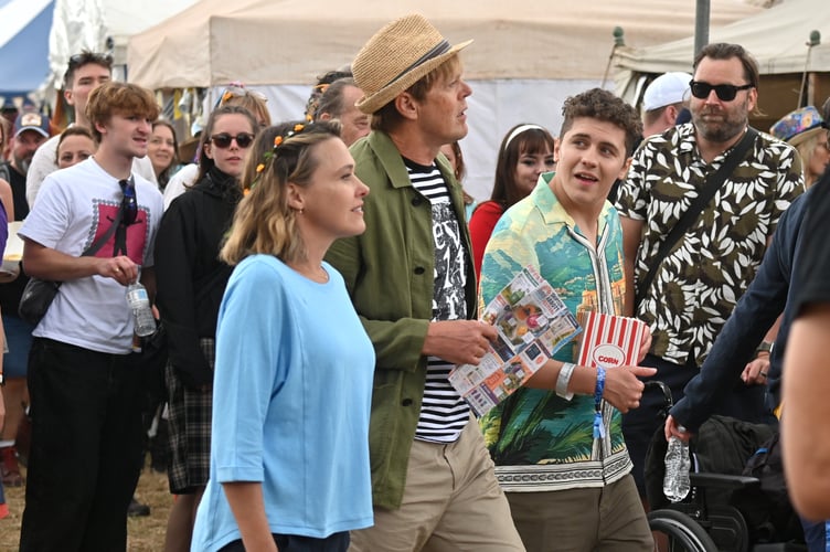 Beautiful Days music festival at Escot Park. Actors. Sally Bretton,  Kris Marshall and Dylan Llewellyn  filming an episode of Beyond Paradise at the event