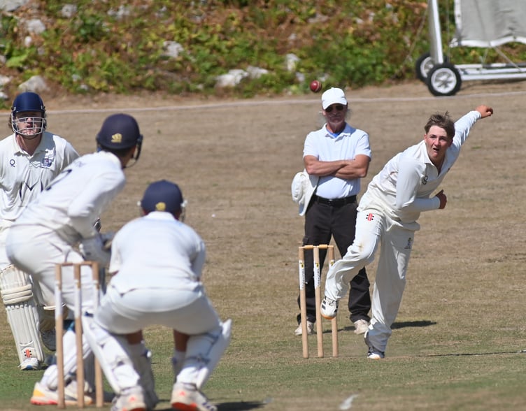 Devon Cricket League C Division West. Ipplepen versus Kingsbridge. Penn's bowler Warrick Green