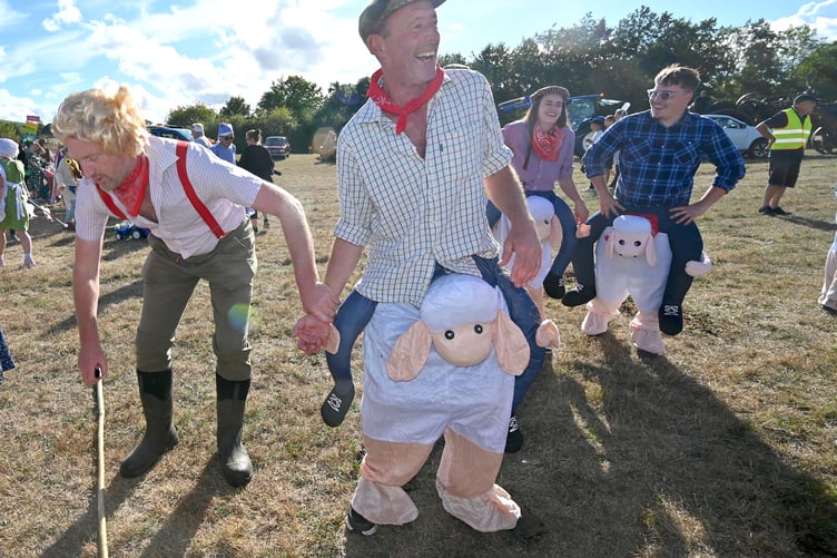Moretonhampstead Carnival. One man and his sheep.