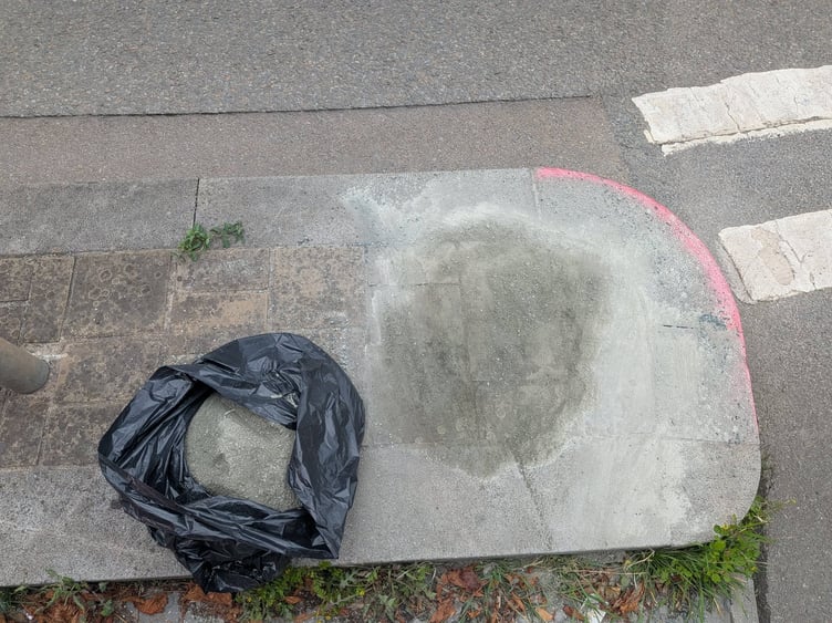 Burst sandbag left for months by a contractor in Dawlish. Photo Cllr Rosie Dawson