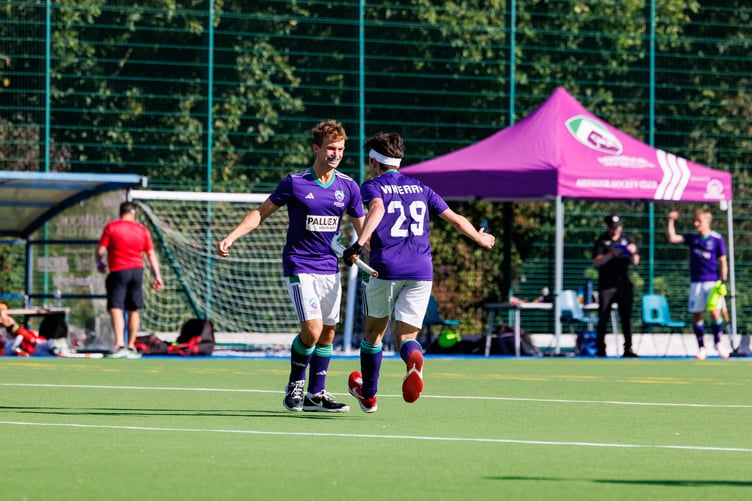 Euan Jones celebrates giving Ashmoor a 3-2 lead with fellow striker Cathan Wherry