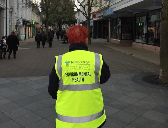 Teignbridge Council environmental health officer in Newton Abbot town centre. Photo Teignbridge Council