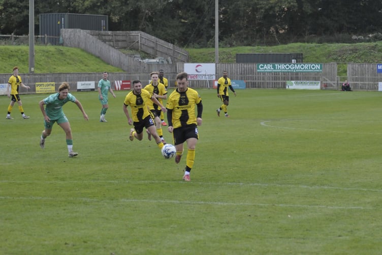 Jack Baxter advances through to open the scoring