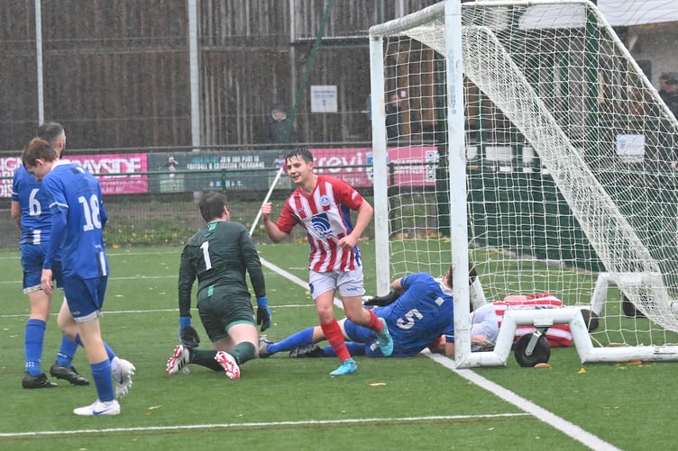 South Devon Football League Division 2. Match action from Paignton Saints 2nds versus Newton Abbot Spurs 3rds. Saints came off second best on a very wet afternoon going down 1-4 to Spurs