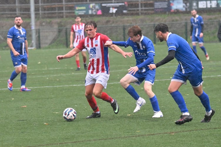 South Devon Football League Division 2. Match action from Paignton Saints 2nds versus Newton Abbot Spurs 3rds. Saints came off second best on a very wet afternoon going down 1-4 to Spurs