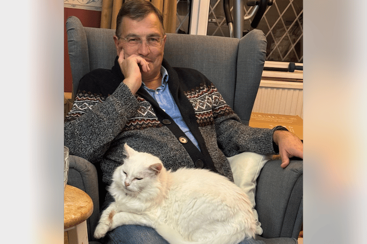 Martin Wrigley with his daughter's cat, Ignatius D Flufflesworth